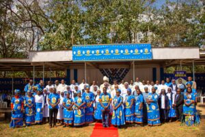 Bishop Peter Adrian Chifukwa joins the executive members and priests of Maula Deanery for a commemorative photo after the unprecedented Mass bringing all 11 parishes together.