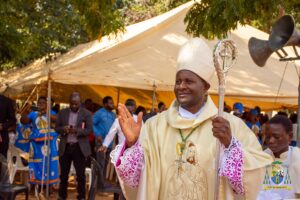 Bishop Peter Adrian Chifukwa blesses the faithful of Maula Deanery during the procession, as they celebrate Our Lady of Africa in a historic show of unity