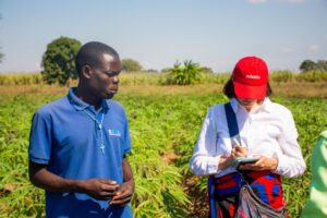 On the farm, Esau and Lucia Bayer (Missio Austria) connect over the project's impact.