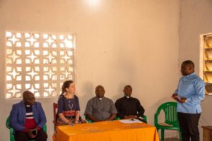 Fr Kaliwamba (in blues shirt) addressing the visitors about Salima Parish