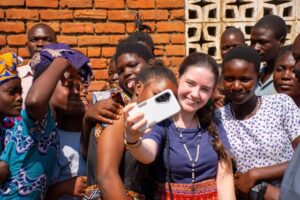 Daria with the youth at Katelera zone