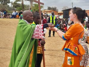 Holy Childhood Coordinator from the Pontifical Mission Societies office from Archdiocese of Boston U.S.A, receiving eucharist during the closing Congress Mass celebration