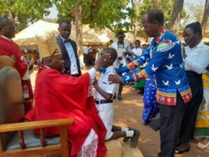 Bishop Mwakhwawa administering the Sacrament of Confirmation to the Young ones.