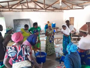 Dzaleka Refugee Women being trained on how to make dish wash soap