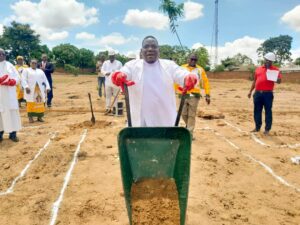 Father Augustine Katundu dean for Mtima Woyera deanery officially opening the construction of Priest house at St Phillip the Apostle Parish