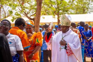  Bishop Mwakhwawa blessing families (CFM) after renewing their vows