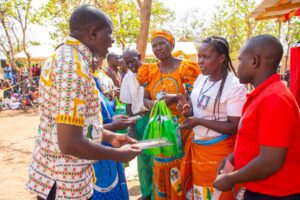 Archdiocese mission team from Legio of Mary , Divine Mercy and Servant of Charity handling over booklets and other materials to the Cathecstic to be used by the associations.