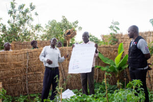 A farmer showcasing local preserving methods of seeds
