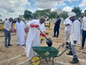 St Phillip the Apostle Parish priest Father John Thawale also taking his turn to launch the project