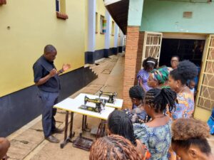 Fr. Richard Chikumbu from Mtima Woyera Parish, blessing the new sewing machines