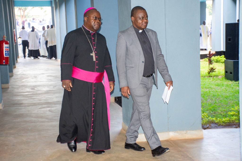 Archbishop Tambala and MCCB Secretary Fr Mtseka touring the new building